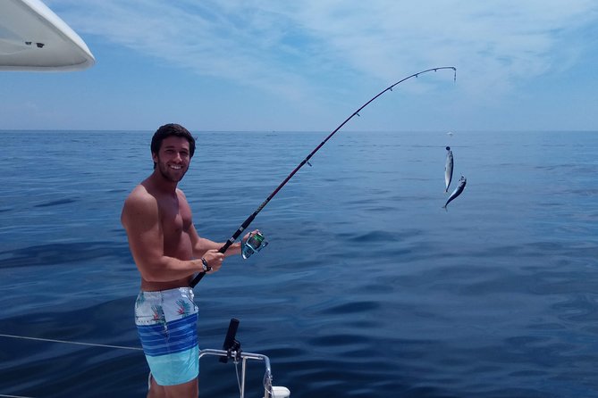 Marbella 2 - hour Catamaran Group Excursion with Dolphin Watching - Puerto Banús Stop: Anchoring, Swimming, and That “Short But Sweet” Feeling