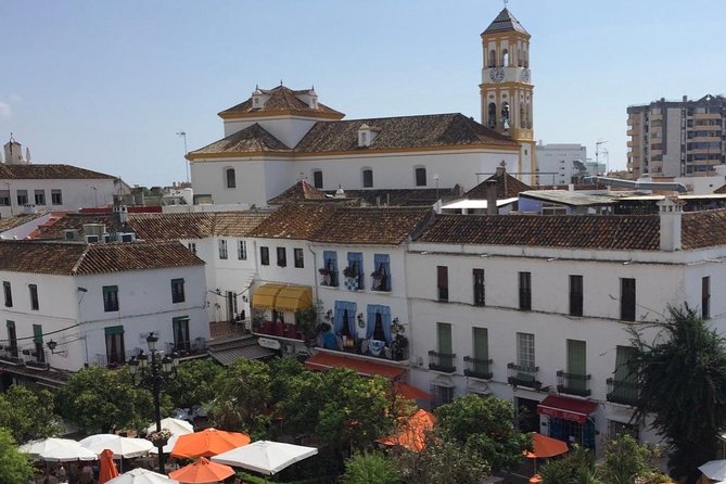Marbella Old Town group tour with a True Local - Paseo Marítimo and Avenida del Mar: From Dali Sculptures to the Promenade