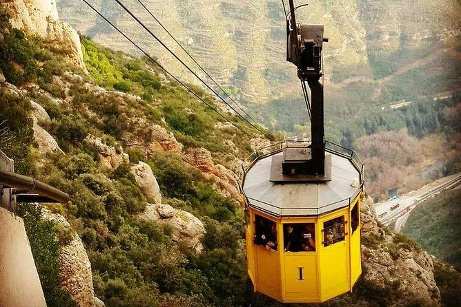 Montserrat Day Trip Private or Small Group with Basilica Tickets - Abadia de Montserrat: monastery views and architecture time