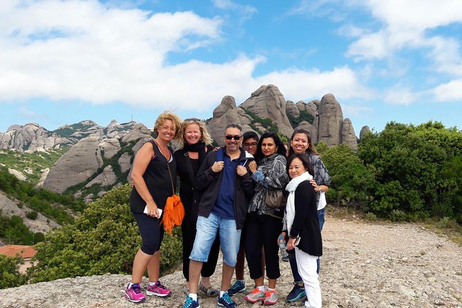 Montserrat Half Day with Cable Car and Easy Hike from Barcelona - The Monastery of Montserrat: basilica, atrium, and chapels with real gravity