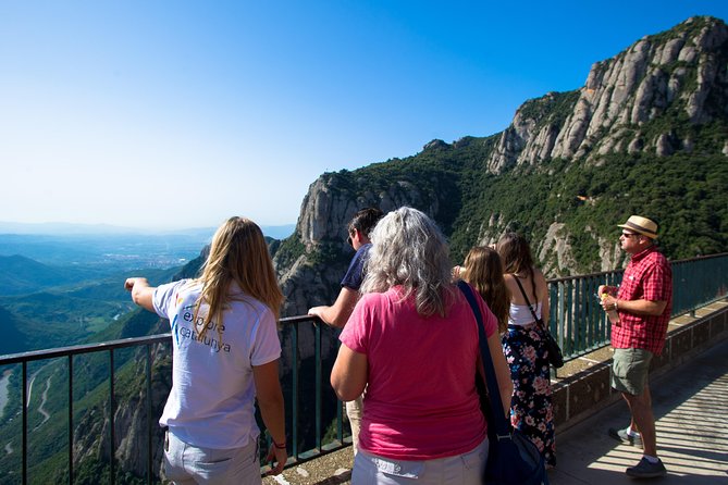 Montserrat & Winery Visit Tour with Traditional Farmhouse Lunch - Wine tasting and cellar tour: family winery, underground caves, and four pours