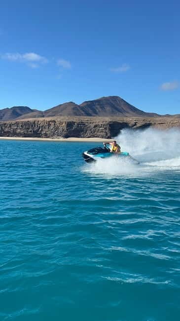Morro Jable: Guided Jet Ski Safari (without license) - Riding the south coast: coves, Punta Jandía, and lighthouse views