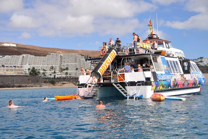 Odyssee 3: The Glass Bottom Boat Tour in Fuerteventura - Best Fit: Families, Dolphin Spotters, and People Who Want a Fun Swim Day