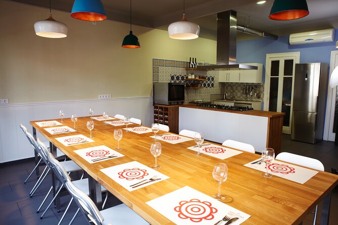 Paella Class & Bottomless Wine: Las Ramblas Views - Las Ramblas views while you cook: an evening that feels local