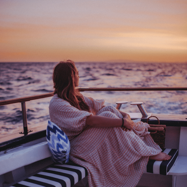 Palma Bay: Boat Tour with BBQ, Snorkelling, & Sunset Option - Music, photos, and the social vibe on Super Delfin Verde