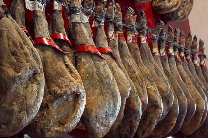 Private: Madrid Historic Centre Food Tour with 10+ Authentic - Stop 1 Food Basecamp: Pastry, 180-Year Deli, Squid Sandwich, and Vermouth