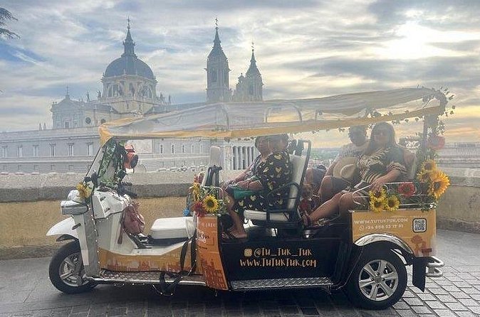 Privately Guided Panoramic Tour in Yellow Tuk Tuk from Madrid - San Jerónimo el Real and Parque del Retiro: calm in the middle of the tour
