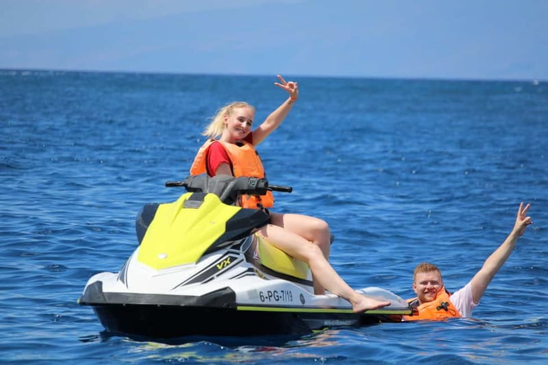 Puerto Colón: Tenerife Coast Jet Ski Tour with Photos - The secret stop: a quick swim plus a photo moment