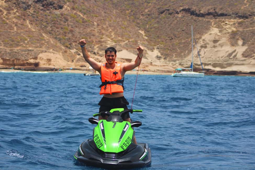 Puerto Colón: Yamaha Jet Ski Tour Along Tenerife's Coast - The secret stop: photos and a brief swim window