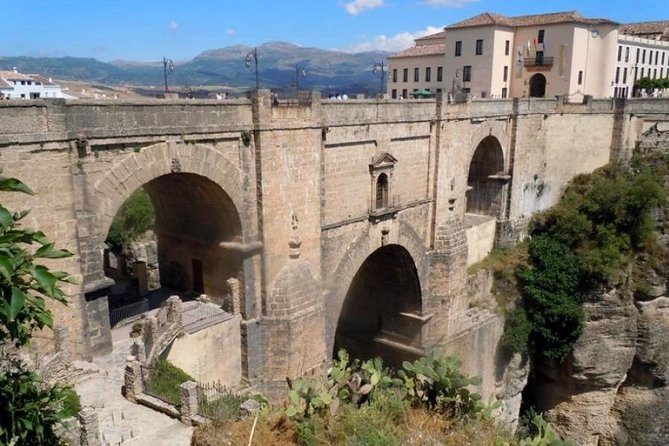 Ronda and Setenil de las Bodegas tour from Malaga - Ronda highlights with a guided circuit: bridges, gates, and bullring history