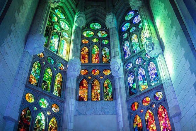 Sagrada Familia Skip the Line Tour Optional Small Group - Inside the basilica: stained glass and the headset that saves your hearing
