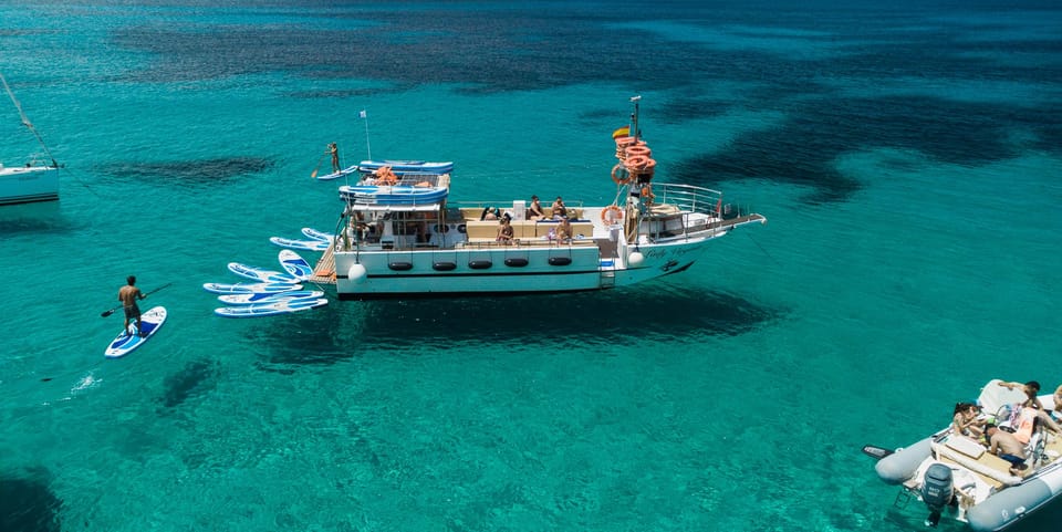 San Antonio: Cala Bassa, Cala Conta and Cave Boat Trip - Cala Bassa Repeat (But Worth It): Another Beach, More Cave-and-Cliff Time