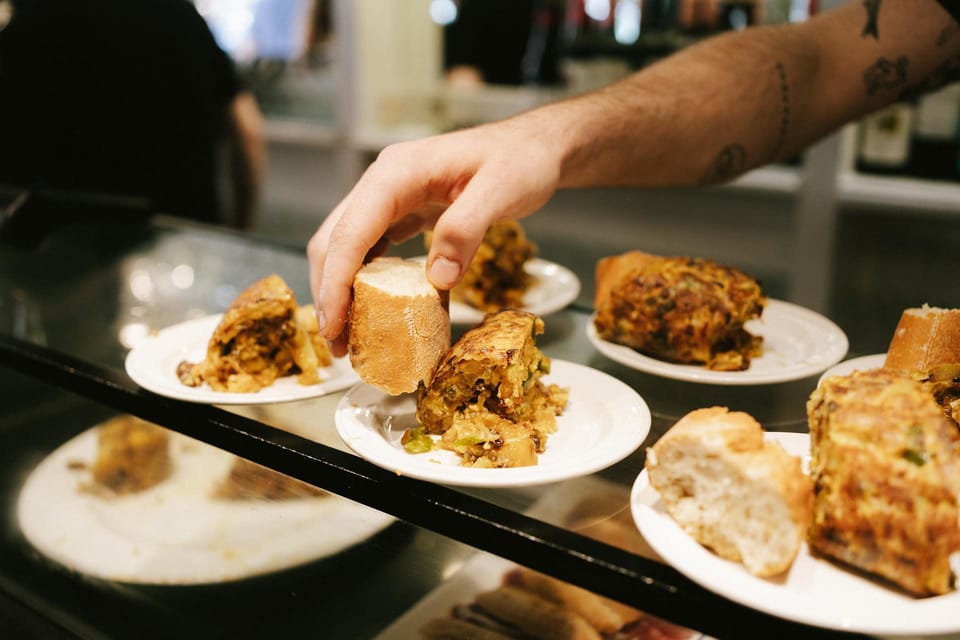 San Sebastian Like a Local: Evening Pintxos Tour - San Martín Market: where the night begins with real vendors