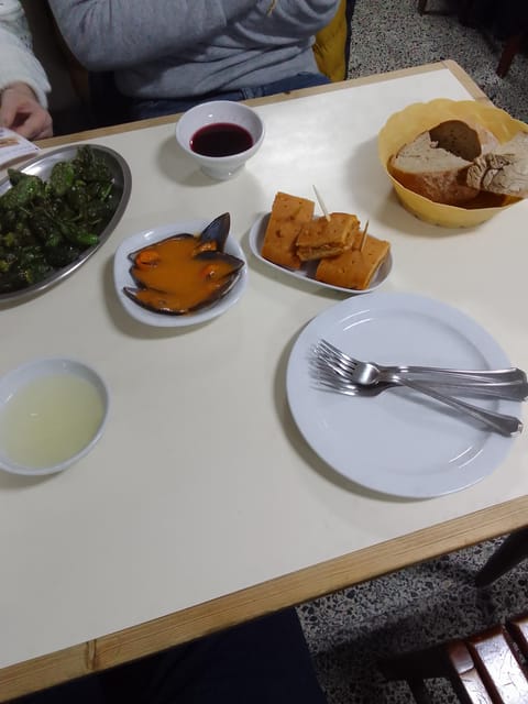 Santiago: Guided Foodie Tour with Drinks, Tapas & Live Music - Second stop and the Camino talk: food with real context