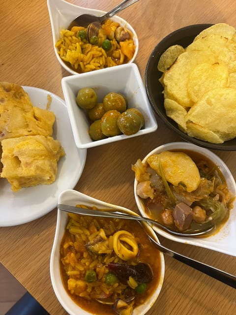 Santiago: Guided Foodie Tour with Drinks, Tapas & Live Music - What you’ll eat and drink: Galician classics (and how they fit)