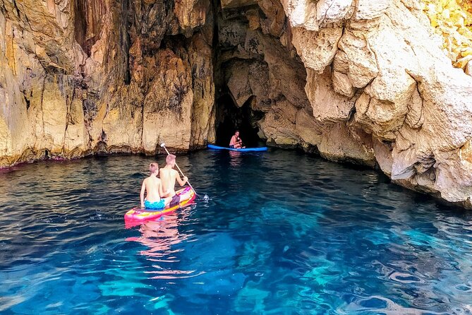 Sea Caves & Coves Snorkeling Paddle Boarding Tour - The Return Through San Antonio Bay: Views and Wind on Your Face