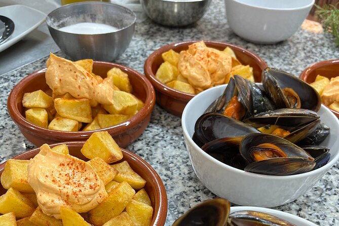 Seafood paella cooking class, tapas and visit to Ruzafa market. - Inside Mercado de Ruzafa: What You’ll Look For
