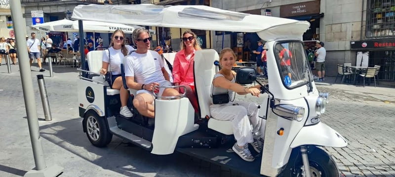"See Madrid Differently: A Premium Private Tuk Tuk Ride" - The Vehicle Experience: High-End Comfort, Shade, and Easy Getting On