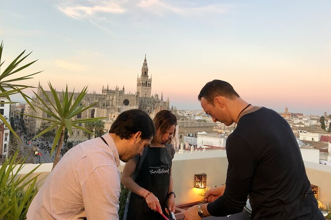 Sevilla: Rooftop Paella Cooking Class & 30-minute expert Q&A - Take-Home Recipes and a Special Souvenir Gift