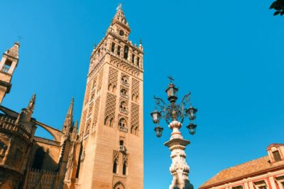 Seville: Alcázar, Cathedral & Giralda Fast Track Guided Tour - Meeting at Plaza del Triunfo and finding your orange umbrella