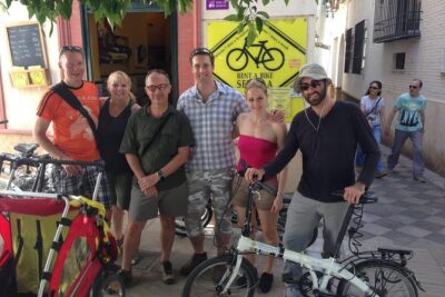 Seville City Bike Tour - Torre del Oro and the river breeze on the Paseo de Cristóbal Colón