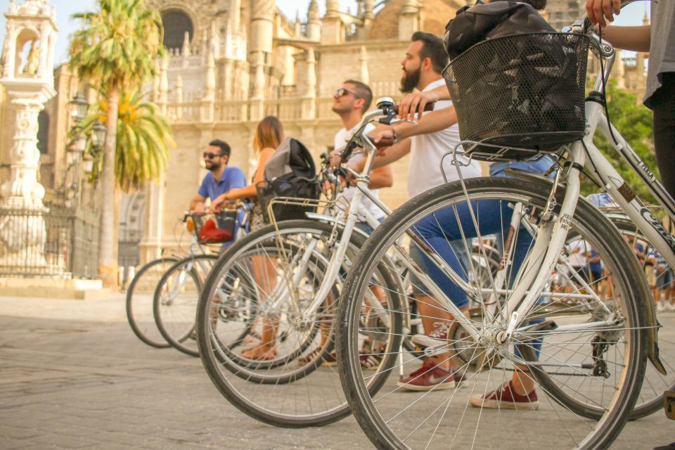 Seville: City Sightseeing and Local Culture Bike Tour - Torre del Oro and San Telmo Palace: noticing details at street speed