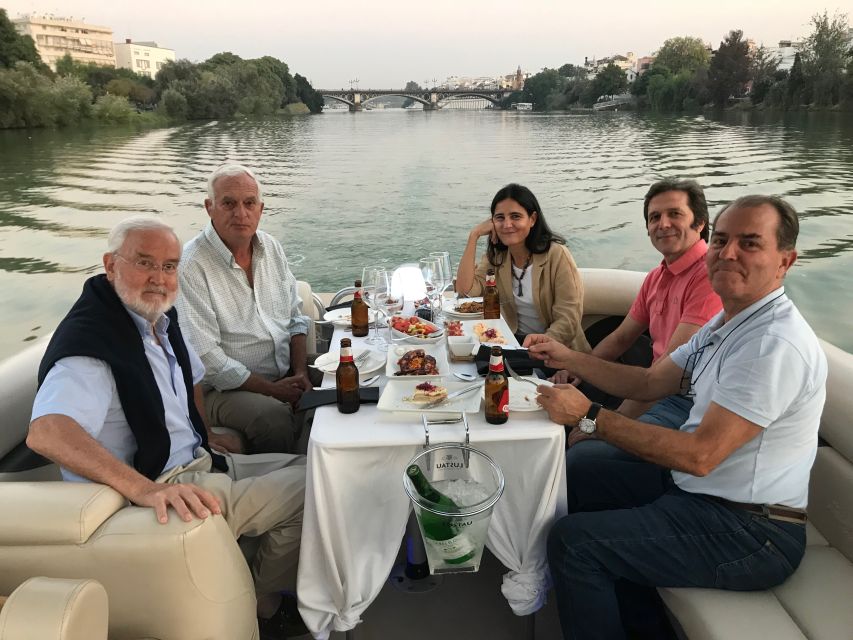 Seville: Exclusive River Boat Tour with Tapas - The historic center from the river: Maestranza, Torre del Oro, San Telmo