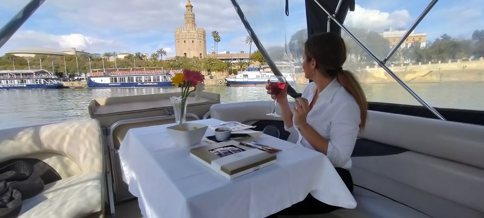 Seville: Exclusive River Boat Tour with Tapas - Tapas and drinks onboard: simple, good enough, and very Seville
