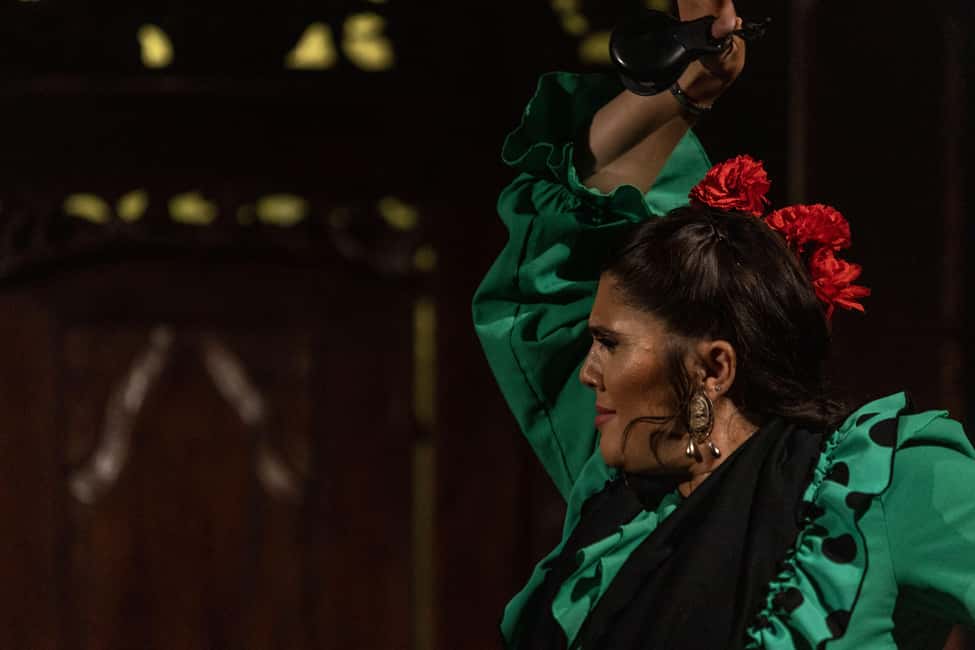 Seville: Flamenco Show at Tablao Almoraima in Triana - Inside the small room: seats, bar entry, and show flow