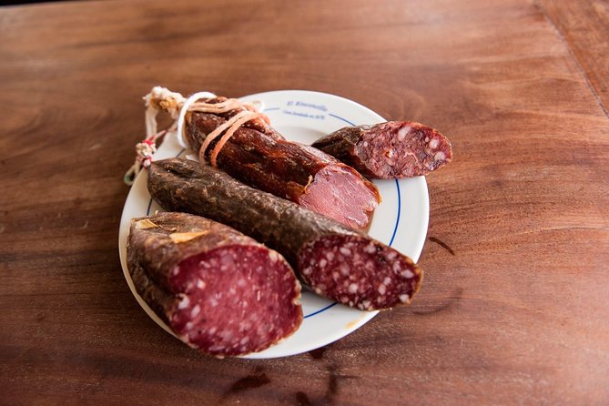 Seville Food Tour: Tapas, Drinks and Delights with a Local - Jamón Ibérico and Queso Near the Giralda