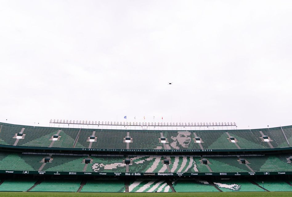 Seville: Real Betis Tour at the La Cartuja Stadium - The guide matters: what to expect in English, Spanish, and Italian