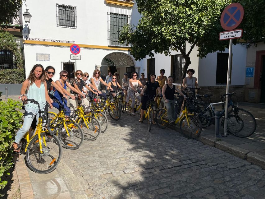 Seville: Relaxing City Bike Tour with a Tour Guide - Parque de María Luisa and Plaza de España: Seville’s Postcard Moment