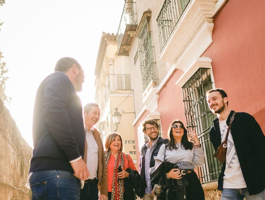 Seville: Small-Group Jewish Quarter Discovery Walking Tour - Plaza del Triunfo and Patio de Banderas: setting the medieval stage
