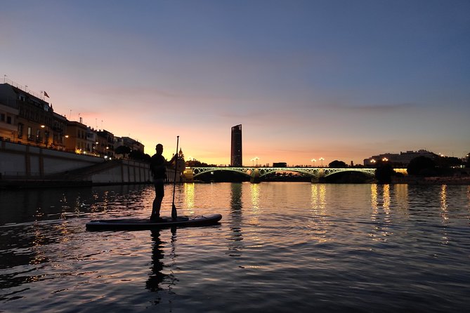 Seville: Sunset in Paddle Surf - Puente de Isabel II (Triana) Moments You’ll Remember