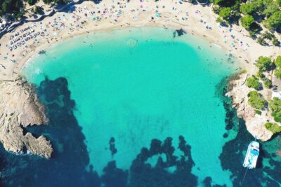 Sunset Beach Hopping Cruise, Cala Comte and Cala Bassa, SUP and snorkelling - On-board swim time: slides, snorkeling, and SUP without extra hassle