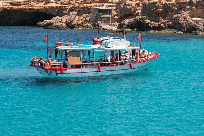 Sunset Beach Tour 3 HS all Inclusive ( Paddle boards , Kayaks & Snorkeling) - The Salvador Ibiza Boat Setup: Sound, Shade, and a Wet Bar