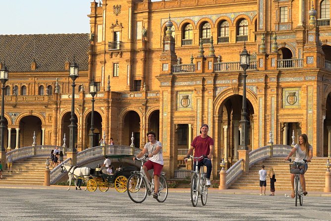Sunset Guided Bike Tour in Seville - Stop-by-stop: Cathedral exteriors, Santa Cruz, and the Alcázar look