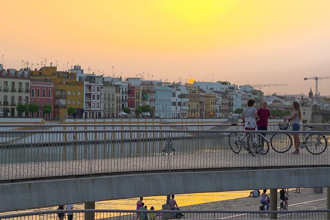 Sunset Guided Bike Tour in Seville - The bike experience: comfortable pace, real city navigation