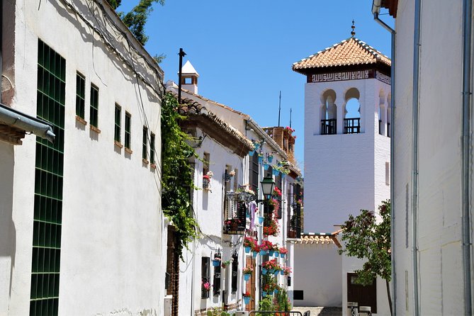 Sunset Walking Tour in Albaicín & Sacromonte - Sacromonte cave streets and the Zirí period wall stop