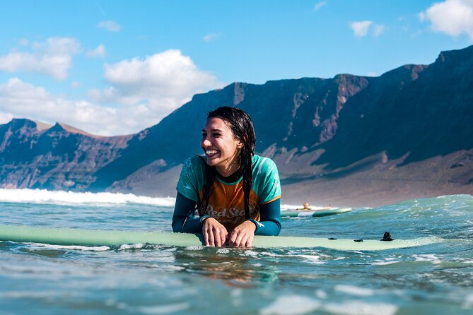 Surf Lesson for Beginners in Famara: Introduction in Surfing - Getting outfitted fast: wetsuit, rash vest, and picking the right board