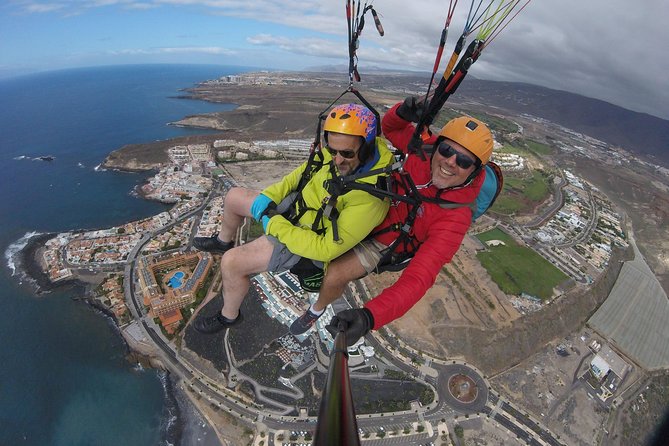 Tandem paragliding in Tenerife - Gear and setup: harness, helmet, and a pilot who leads