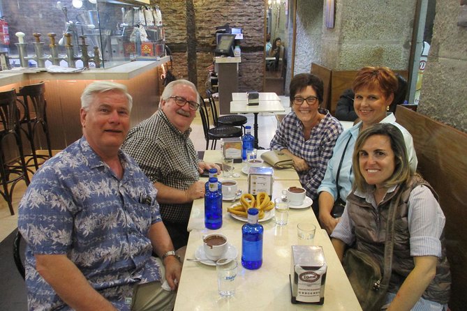 Tapas and history tour ending with churros with chocolate - Puerta del Sol history interlude: the square behind the vibe