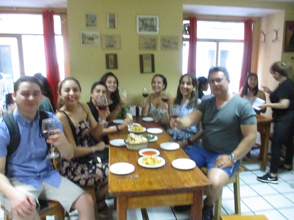 Tapas and history tour ending with churros with chocolate - Medieval Madrid stop near Arco de Cuchilleros: more tapas, less tourist mode