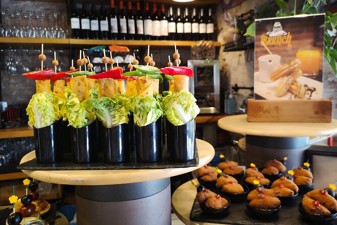 Tapas, Wine and Flamenco Private Tour in Barcelona - The Gothic Quarter walk: medieval streets plus Roman wall clues