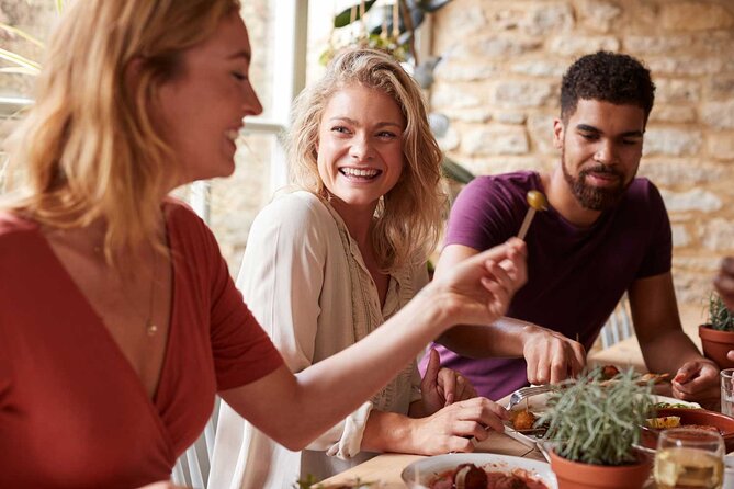 Tasty Tapas & Drinks Tour with a Rooftop Included - Guides that turn a bar crawl into a story
