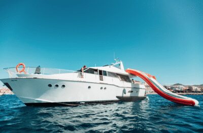 Tenerife: Fun Yacht Trip with Water Activities and Toys - Getting On Board at Puerto Colón: Timing, Meeting Point, and What to Bring