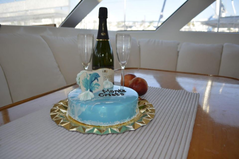 Tenerife: Sunset Catamaran Tour with Transfer, Buff & Drinks - Hotel pickup from Costa Adeje and Los Cristianos (no car needed)