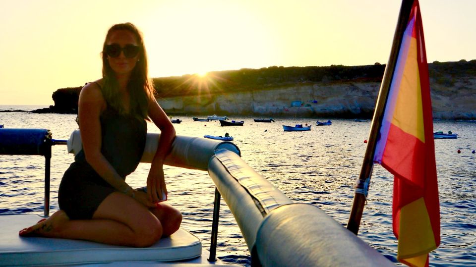 Tenerife: Sunset Catamaran Tour with Transfer, Buff & Drinks - The anchored bay break: swimming and snorkeling time