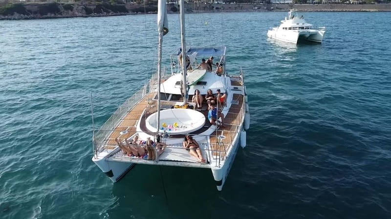 Torrevieja: Catamaran cruise and sunset with swimming - Your Torrevieja water hour: swimming, snorkeling, floats, and SUP