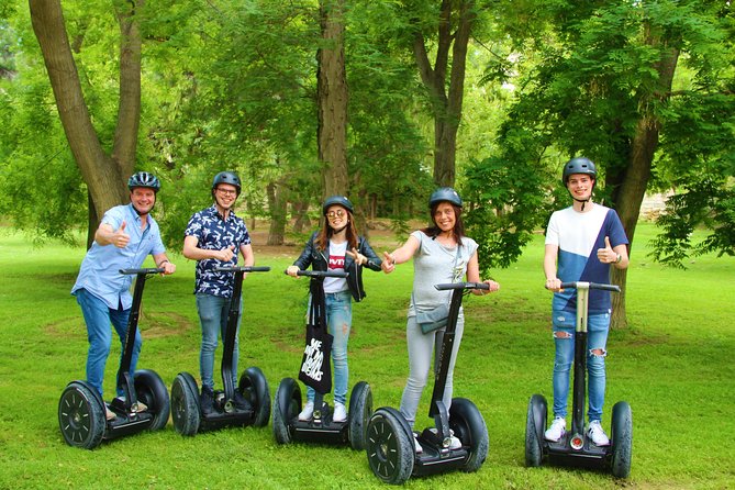 Turia Gardens Private Segway Tour - Royal Gardens: sculptures, arches, and trees from far away